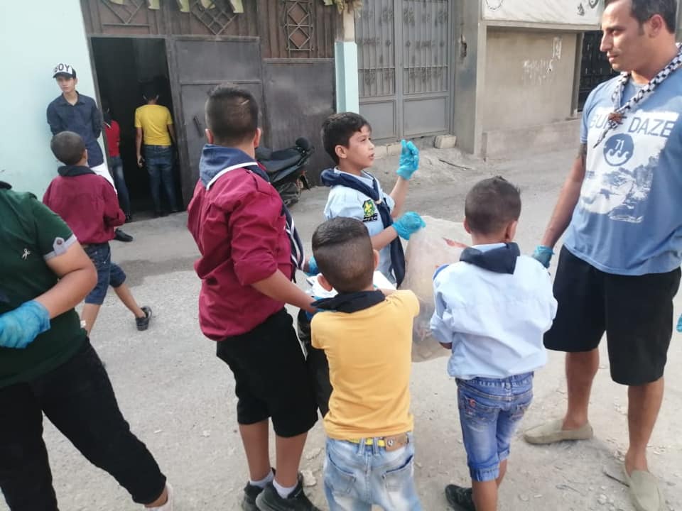 كشافة الوحدة في مخيم نهر البارد قامت بحملة تنظيف لشارع بيت المقدس