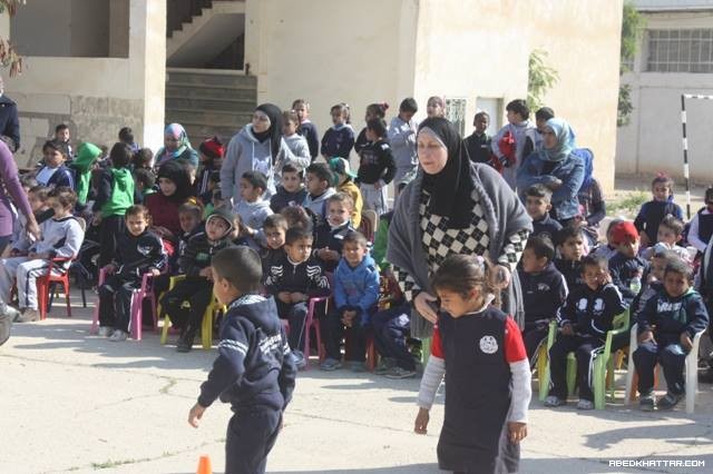 قوات الأمن الوطني في اريحا ترسم البسمة على وجوه الأطفال
