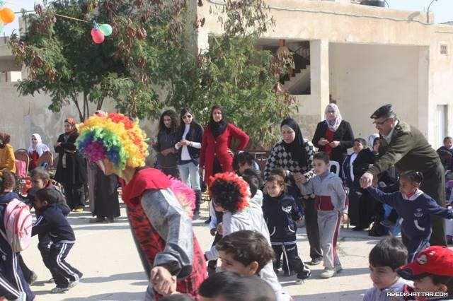 قوات الأمن الوطني في اريحا ترسم البسمة على وجوه الأطفال