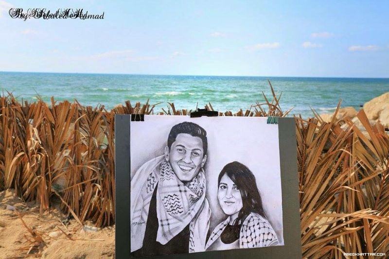 بالصور .. رسام فلسطيني يرسم لوحة للفنان محمد عساف والفنانة ميرنا عيسى