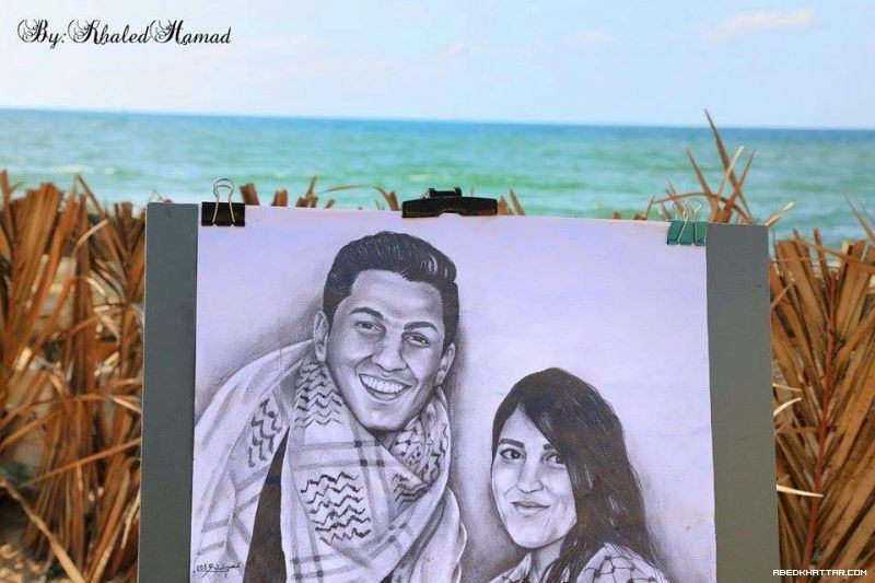 بالصور .. رسام فلسطيني يرسم لوحة للفنان محمد عساف والفنانة ميرنا عيسى